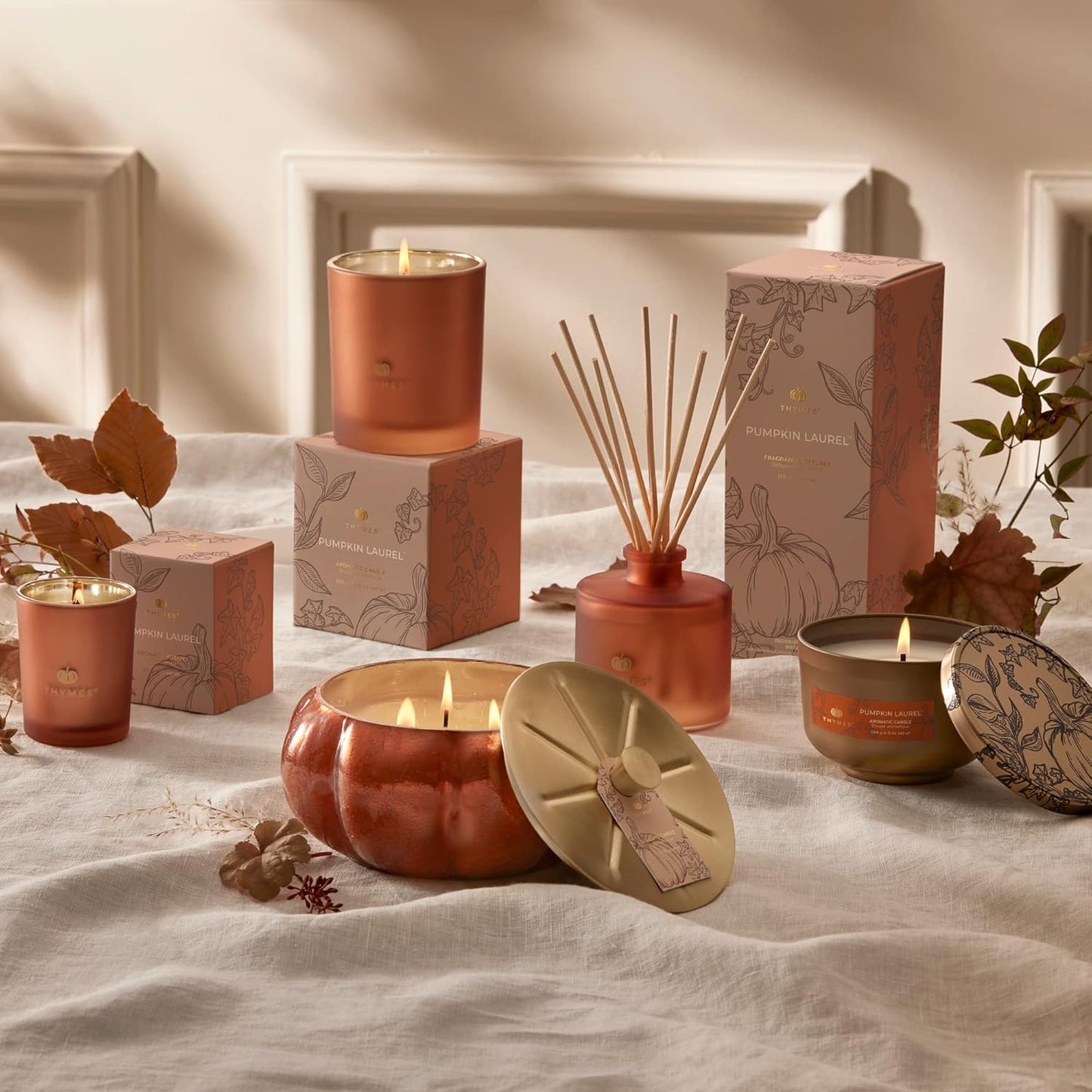 Thymes Scented Candles for Women & Men – Tin with Lid – Luxury Home Decor – Pumpkin Candles with Notes of Nutmeg, Cinnamon, Clove, & Orange Peel – Fall Decor (Pumpkin Laurel, 6.5 oz)