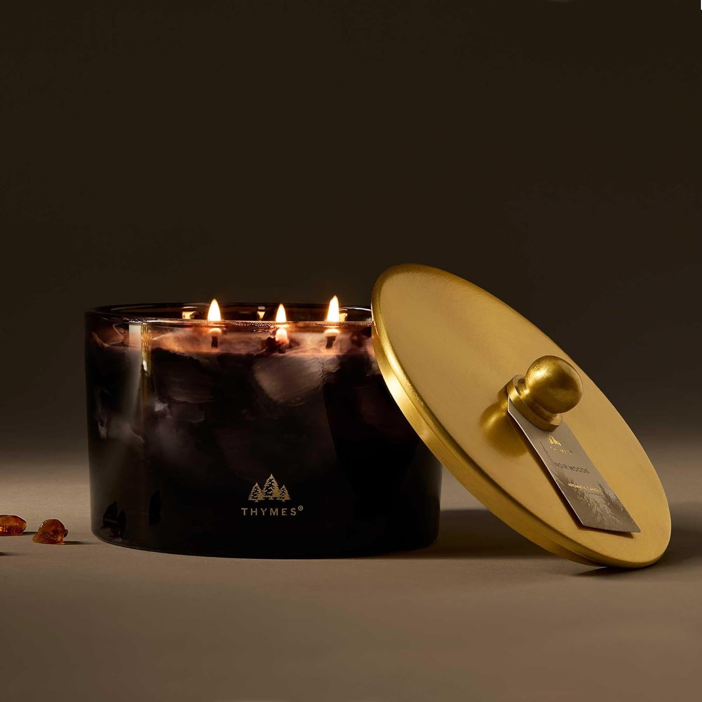 Thymes Noir Woods Scented Candles for Home Decor – Notes of Fresh Evergreen, Smoky Wood & Golden Amber – Luxury Home Fragrance Gifts for Women & Men – Burns Up to 38 Hrs (Large 3 Wick Candle, 18 oz)