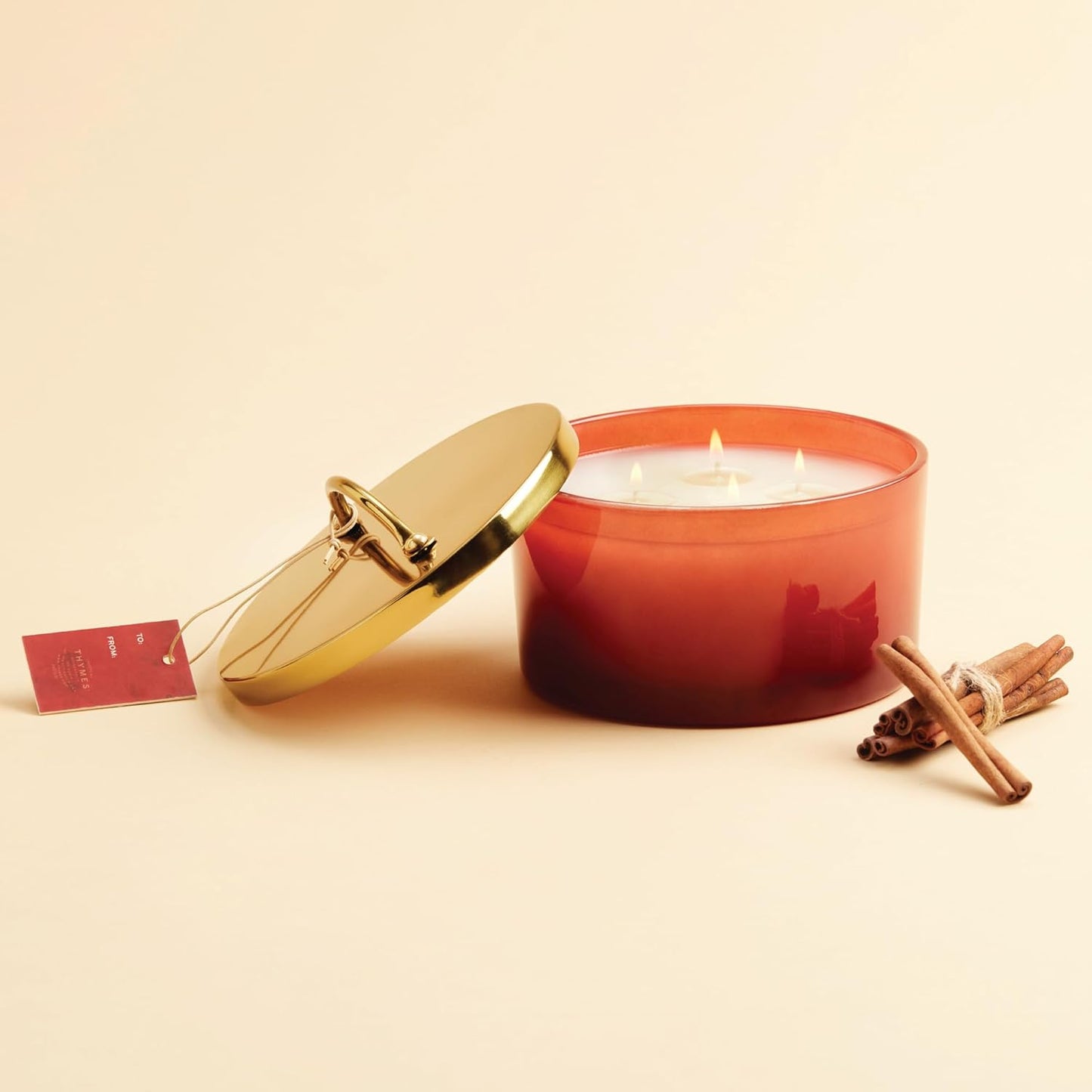 Thymes Simmered Cider Harvest Red 4-Wick Candle – Warm & Spicy Scented Candle with Notes of Freshly Pressed Apple, Clove, & Cardamom – Luxury Home Fragrance – Fall Decor – Red with Gold Lid (21 oz)
