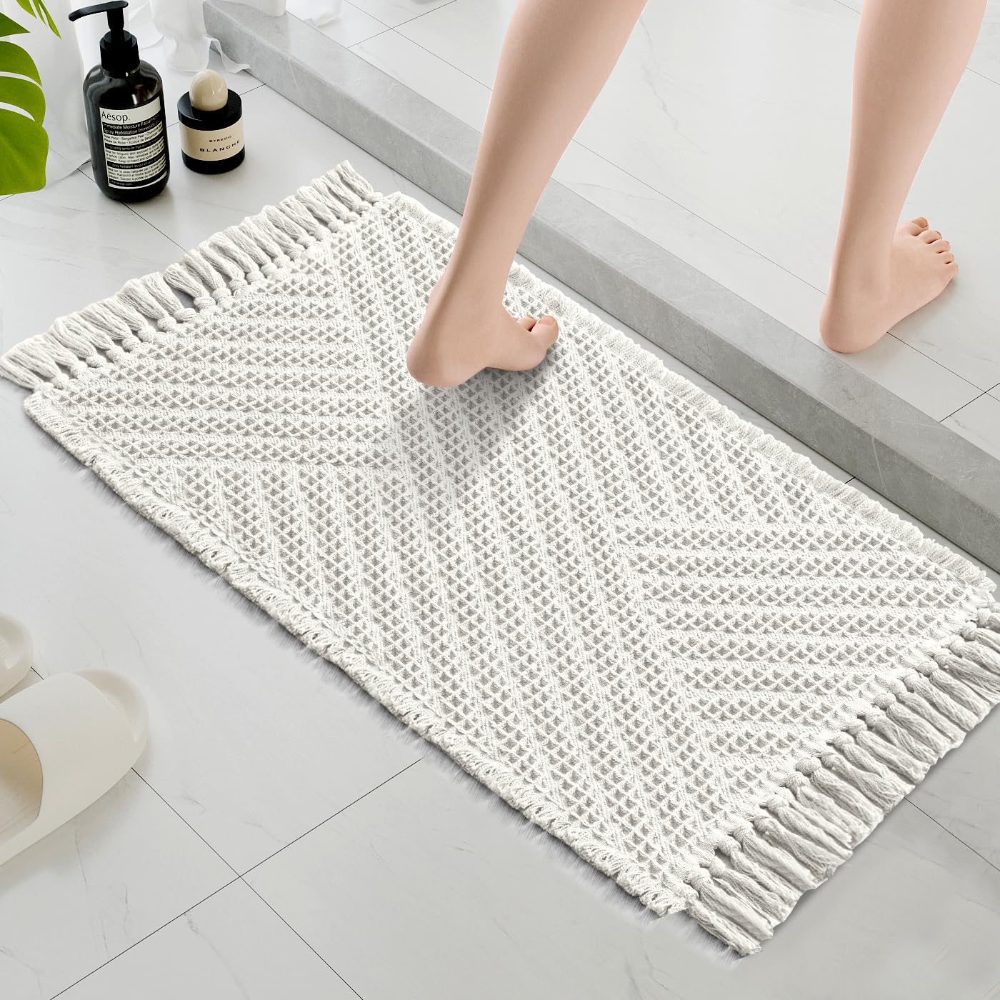 H.VERSAILTEX Waffle Bath Mat Super Absorbent Boho Bath Mat Non Slip Bath Rugs for Bathroom Floor Machine Washable Dry Fast Bathroom Rugs with Tassels, 17" x 24", Ivory White