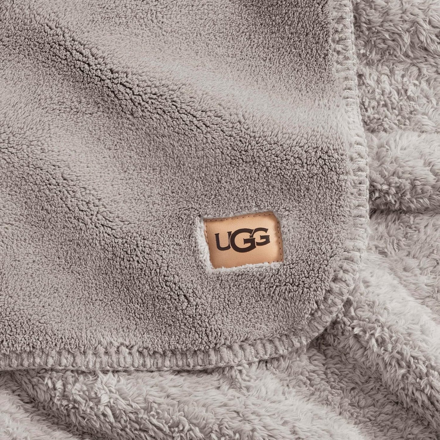 UGG Whitecap Plush Throw Blanket Fleece Lightweight Soft Throw for Couch or Bed Luxury Home Decor for Living Room Washable Hypoallergenic Blankets for Dorm Decor, 50-inch x 70-inch, Light Grey Seal